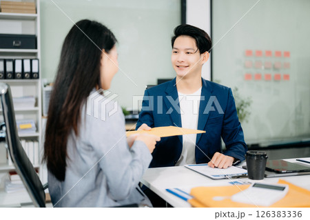 Asian business team and lawyers discussing contract papers sitting at the table. Concepts of law, Asian business team and lawyers discussing contract papers sitting at the table. Concepts of law, 126383336