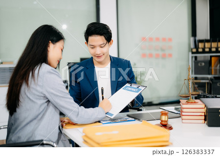 Woman lawyer hand and women client shaking hand collaborate on working agreements 126383337