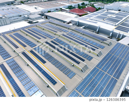 Solar-powered warehouse facility. Modern distribution center with rooftop solar panel. Eco-friendly warehouse. Sustainable logistics solutions for reduced carbon footprint. Sustainable energy. 126386395