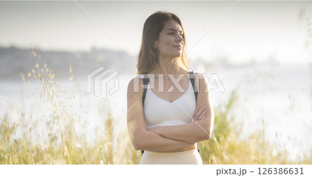 Hiker admiring landscape during outdoor adventure Hiker admiring landscape during outdoor adventure 126386631