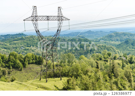 Power Lines Crossing Mountain Landscape in Georgia 126386977