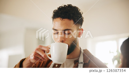 Man, chef and drinking coffee in kitchen for morning beverage, break or caffeine at home. Male person, relax and enjoying espresso with mug or cup for warm latte, cappuccino or comfort at house Man, chef and drinking coffee in kitchen for morning beverage, break or caffeine at home. Male person, relax and enjoying espresso with mug or cup for warm latte, cappuccino or comfort at house 126387354