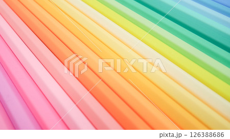 a vivid and well-defined spectrum of pastel-colored rods arranged diagonally, transitioning smoothly from pinks through oranges, yellows, greens, and into blues 126388686