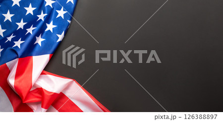 Black background with American flag. Independence day. Website banner and greeting card design template. Black background with American flag. Independence day. Website banner and greeting card design template. 126388897