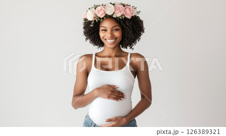 Radiant Pregnant Woman Smiling with Floral Crown Radiant Pregnant Woman Smiling with Floral Crown 126389321