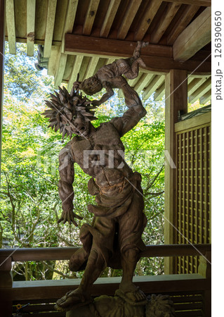 Wooden Oni demon statue at Mitaki-Dera temple in Hiroshima, Japan Wooden Oni demon statue at Mitaki-Dera temple in Hiroshima, Japan 126390650