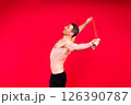 Portrait, happy man and bodybuilder with abs on studio background, backdrop and topless pride 126390787