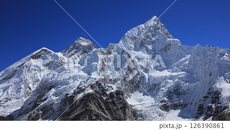 Blue sky over Mt Everest and Nuptse, view from Kala Patthar, Nepal. Blue sky over Mt Everest and Nuptse, view from Kala Patthar, Nepal. 126390861