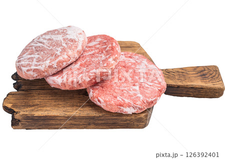 Frozen raw Hamburger beef Patty, uncooked mincemeat. isolated on white background. top view Frozen raw Hamburger beef Patty, uncooked mincemeat. isolated on white background. top view 126392401