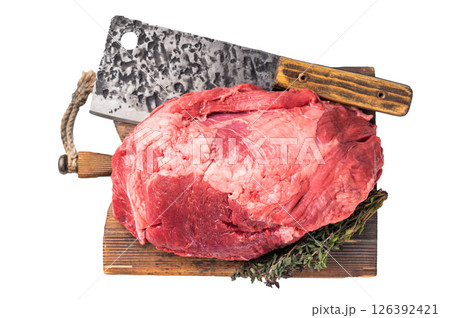 Fresh raw boneless beef shank displayed on a wooden cutting board, showcasing its rich color and marbling, perfect for hearty soups and stews. isolated on white background. top view 126392421