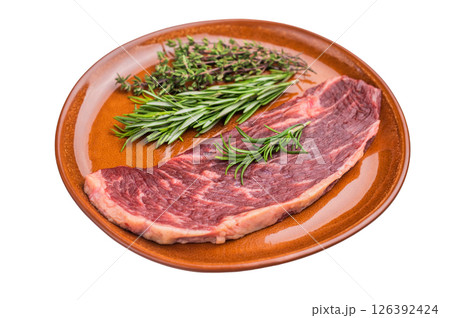 Uncooked sirloin cut, raw beef steak known for its tenderness and robust flavor. isolated on white background. top view Uncooked sirloin cut, raw beef steak known for its tenderness and robust flavor. isolated on white background. top view 126392424
