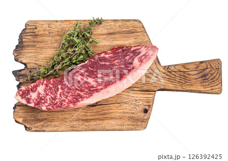 Fresh raw Brazilian picanha steak, beef meat, showcasing its rich marbling and vibrant color. isolated on white background. top view 126392425