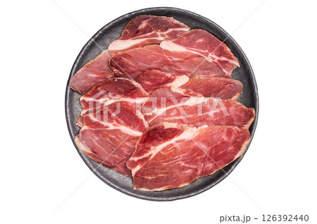 Thin slices of Speck, Jambon Italian cured meat isolated on white background. top view 126392440