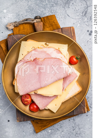 Ham and cheese sandwich, toast with sliced Prosciutto Cotto. grey background. top view 126392548