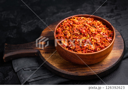 Dried and chopped Tomato for cooking. black background. top view 126392623