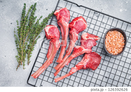 Raw lamb meat chops, fresh mutton cutlets. grey background. top view 126392626
