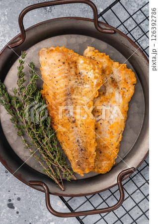 Fried pollock white fish fillet. grey background. top view 126392786