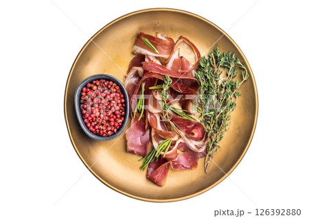 Cured duck fillet meat slices, magret smoked poultry on a plate isolated on white background. top view 126392880