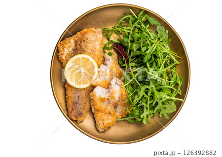Roasted Pollock fish fillet on a plate with salad isolated on white background. top view 126392882