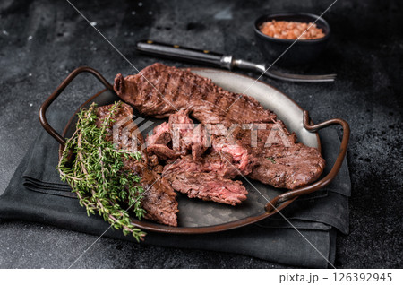 Grilled Beef Machete Skirt Steak, prime meat. black background. top view 126392945