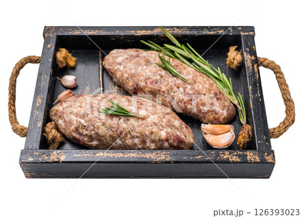 Raw kebabs or kabaps on wooden tray, beautifully arranged and ready to be cooked for a delicious outdoor feast. isolated on white background. top view 126393023