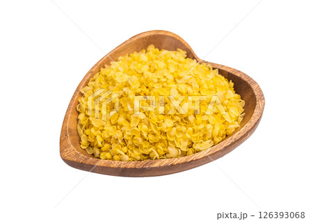 Millet flakes in wooden bowl, rolled millet for porridge and muesli isolated on white background. top view Millet flakes in wooden bowl, rolled millet for porridge and muesli isolated on white background. top view 126393068