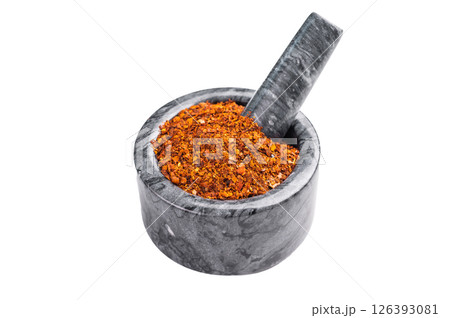 Cooking of Red Chili pepper and paprika flakes isolated on white background. top view Cooking of Red Chili pepper and paprika flakes isolated on white background. top view 126393081