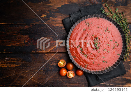 Tomato paste sauce with thyme in plate, canned food for cookng. wooden background. top view 126393145