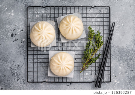 Baozi Bun, Chinese Steamed bun with meat. grey background. top view 126393287