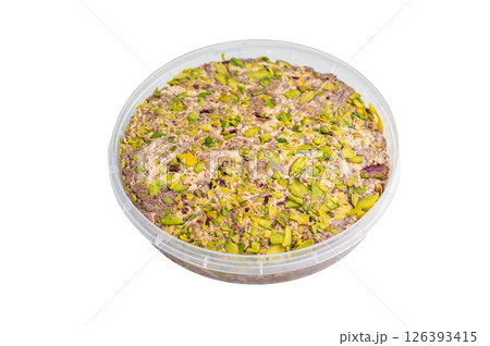 Turkish Halva with tahini and pistachio isolated on a white background. top view 126393415