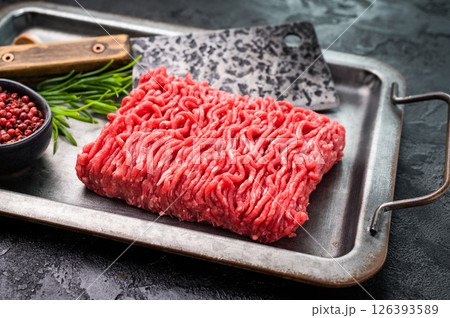Uncooked Raw beef mince meat, forcemeat, in kitchen tray ready for cooking. 126393589