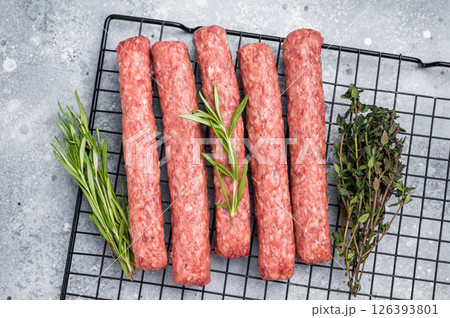 Raw beef and lamb meat kebabs sausages, kofta kebab. grey background. top view 126393801