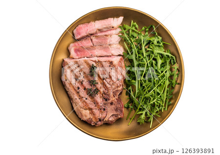 Roasted BBQ pork neck meat steak on plate with salad isolated on white background. top view 126393891