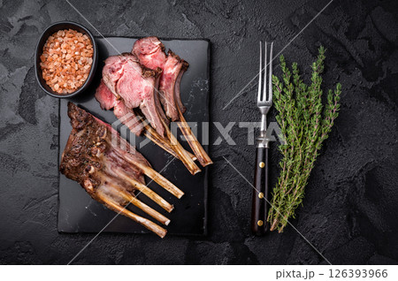 Roasted lamb chops steaks, mutton meat cutlets. black background. top view 126393966