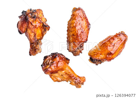 Deliciously sticky teriyakis sauce chicken wings, bursting with flavor, perfect for sharing at festive occasions or family dinners. isolated on white background. top view Deliciously sticky teriyakis sauce chicken wings, bursting with flavor, perfect for sharing at festive occasions or family dinners. isolated on white background. top view 126394077