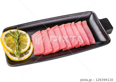 Premium quality tuna sashimi, expertly cut for maximum tenderness and taste, perfect for sushi enthusiasts. isolated on white background. top view 126394110
