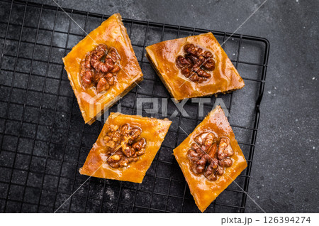 Traditional Honey Walnut Baklava. black background. top view 126394274