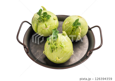 Raw kohlrabi on steel tray, Vegetable from Organic farm isolated on white backround. top view Raw kohlrabi on steel tray, Vegetable from Organic farm isolated on white backround. top view 126394359