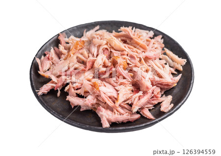 Spicy shredded or Pulled Chicken meat on plate isolated on white background Spicy shredded or Pulled Chicken meat on plate isolated on white background 126394559
