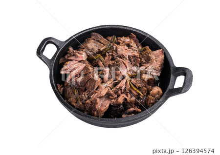 Slow cooked Shredded beef ragu in a skillet isolated on a white background. top view Slow cooked Shredded beef ragu in a skillet isolated on a white background. top view 126394574