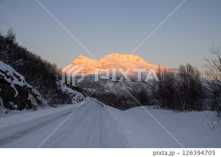 Road and mountain in the winter sunrise, Norway 126394705