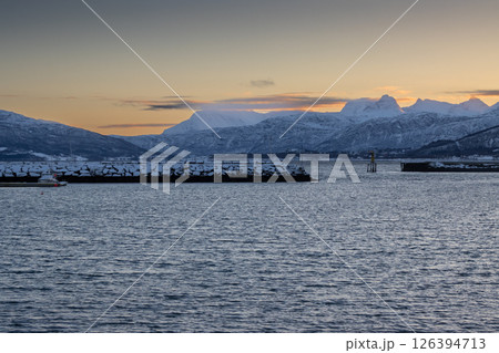 Mountains with snow in sunrise, Hamnvik, Norway Mountains with snow in sunrise, Hamnvik, Norway 126394713