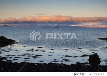 Mountains with snow in sunrise, Hamnvik, Norway Mountains with snow in sunrise, Hamnvik, Norway 126394714
