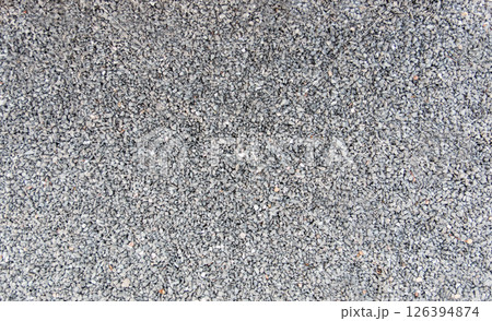 Pattern stone floor with old cement path. Floor texture background in sunny summer day. 126394874