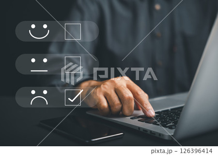 Negative feedback concept through 1-star rating in survey. Portraying customer dissatisfaction and disappointment with user experience on smartphone. Emphasizing significance of customer satisfaction. Negative feedback concept through 1-star rating in survey. Portraying customer dissatisfaction and disappointment with user experience on smartphone. Emphasizing significance of customer satisfaction. 126396414