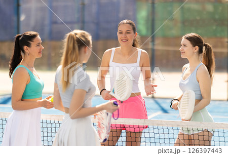 Women standing and talking on the court 126397443