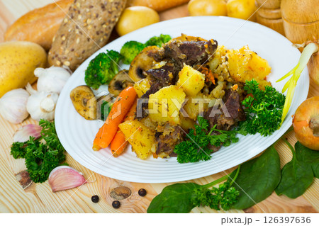 Fried beef served with mushrooms Fried beef served with mushrooms 126397636