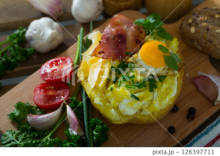 Appetizing baked potato filling with cheese 126397711