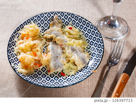 Plate containing light salted herring with marinated cabbage Plate containing light salted herring with marinated cabbage 126397713