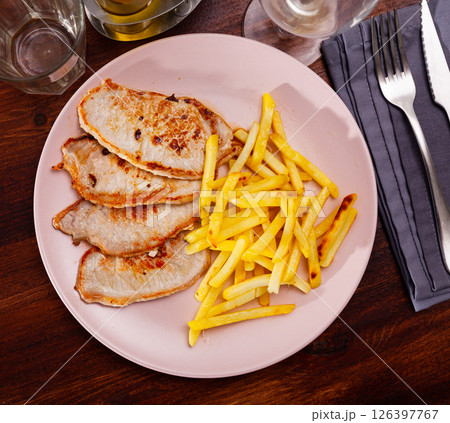 Fried barbecue pork meat with baked potato Fried barbecue pork meat with baked potato 126397767